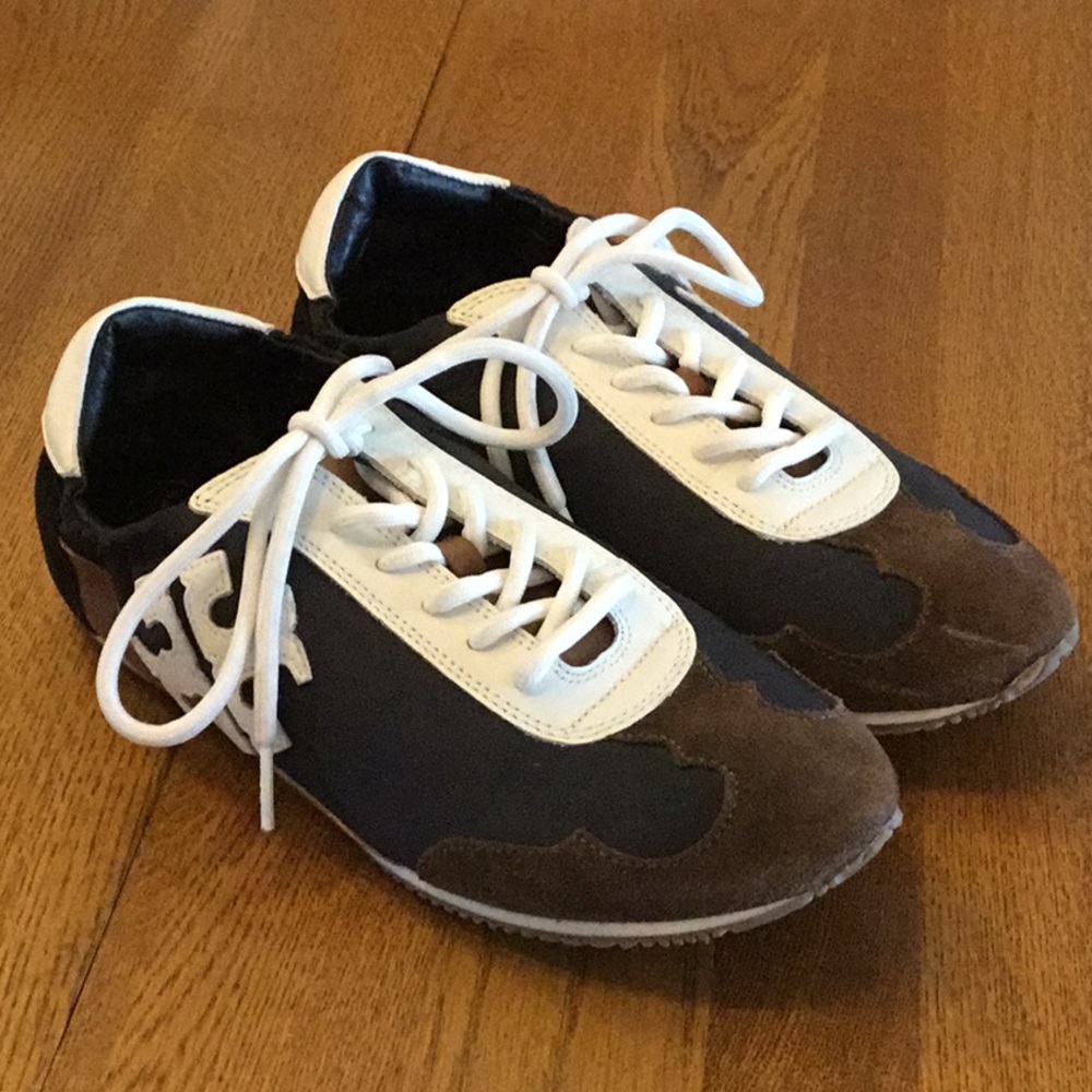 Woman’s Tori Burch black/tan/white sneaker. Size 7. White laces. Barely worn!